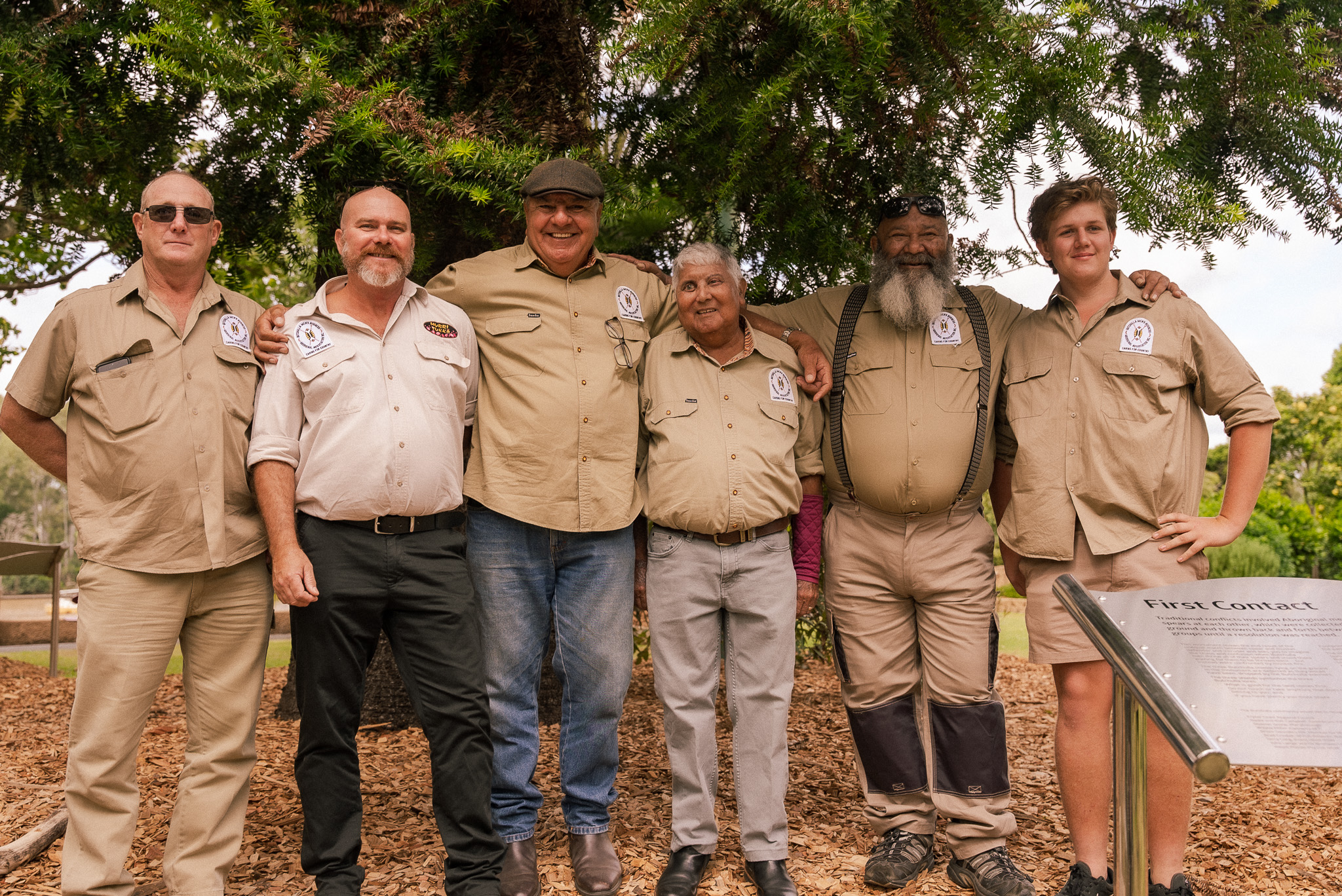 Members of the Butchulla Men&#039;s Business Aboriginal Association Inc. pose with the Butchulla Warriors&#039; Memorial