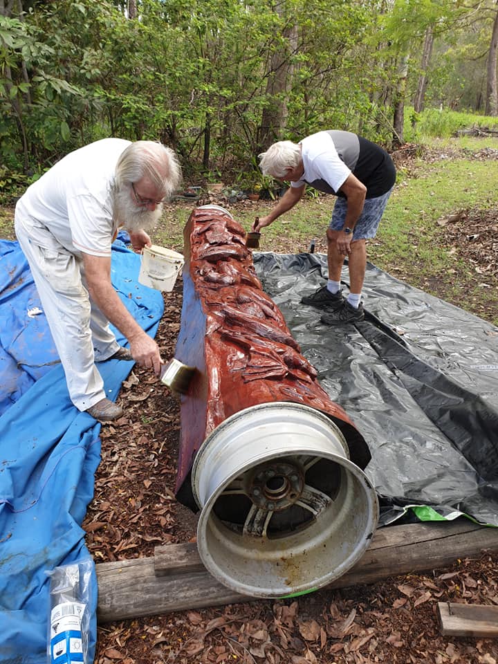 Staining the Peace Pole. Photo: Courtesy Maryborough-Sunrise Club.