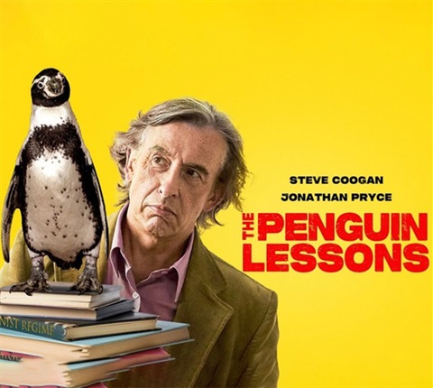 The Penguin Lessons promotional image featuring Steve Coogan alongside a penguin standing on a pile of books