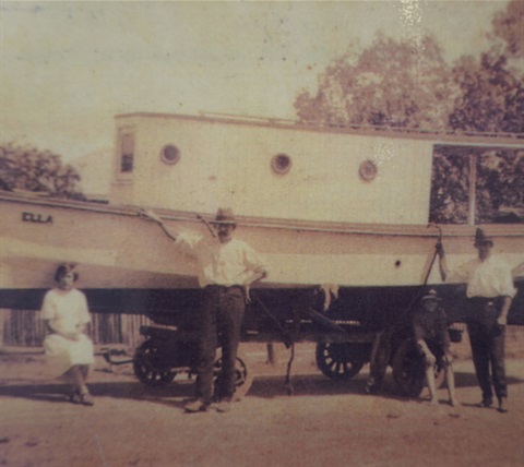 Old photo of Ella boat with owners