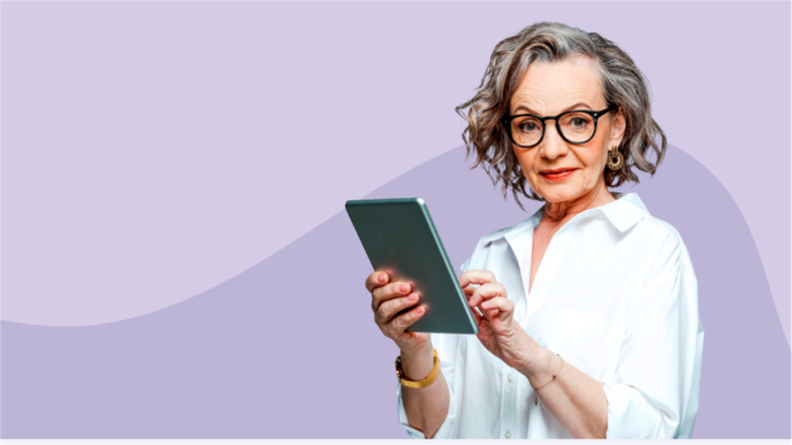 Older woman viewing portable device.png