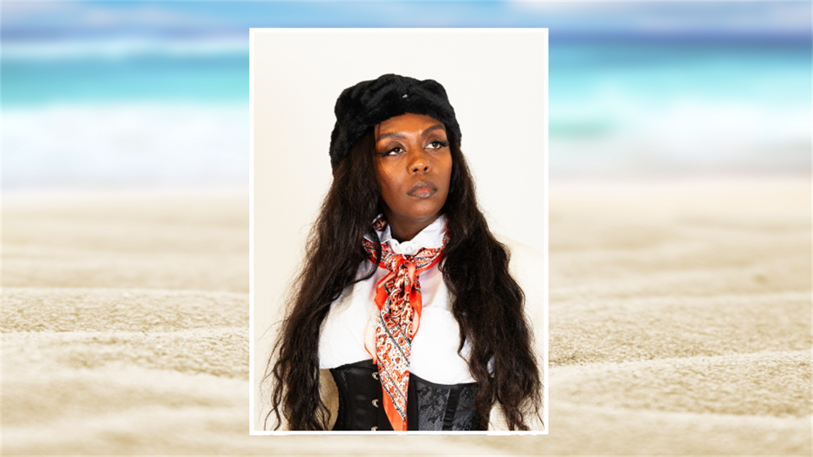 Headshot of poet Huda the Goddess