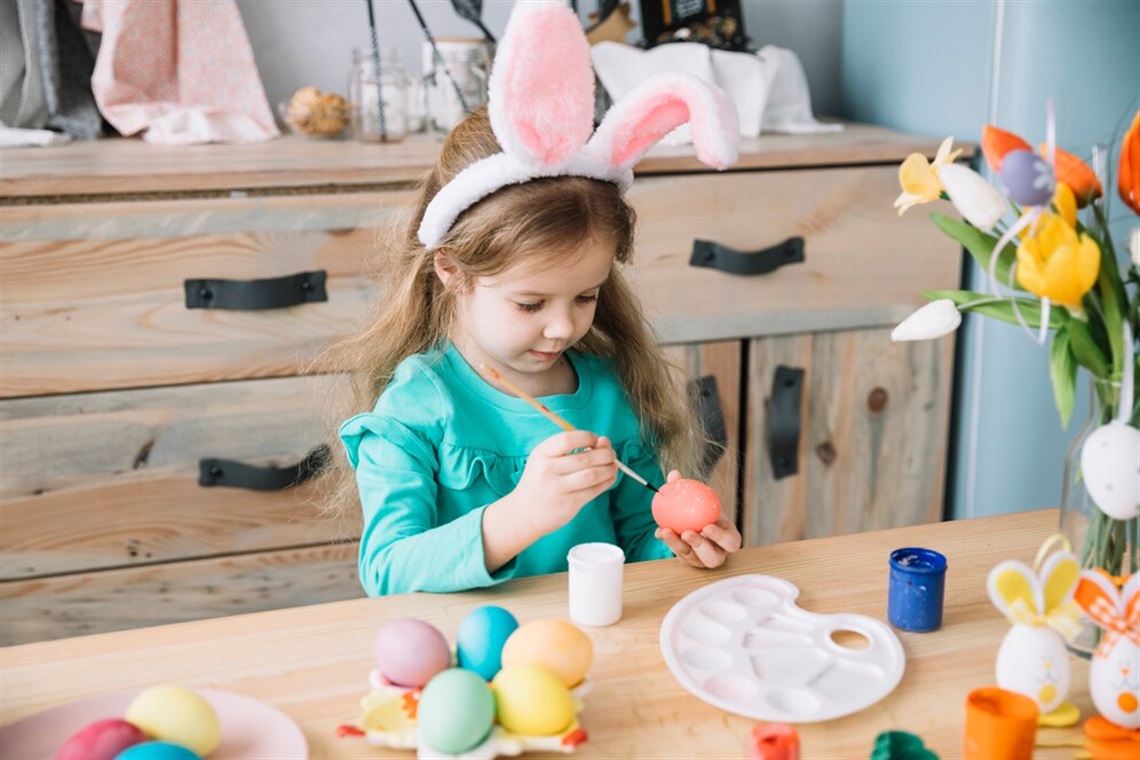 girl-bunny-ears-painting-eggs-easter_23-2148053708.jpg