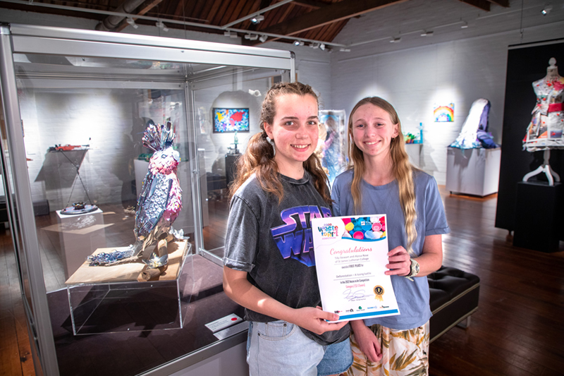 Friends Tilly Stewart and Alyssa Rose, Category 2 Winners with 'Deforestation – a losing battle'