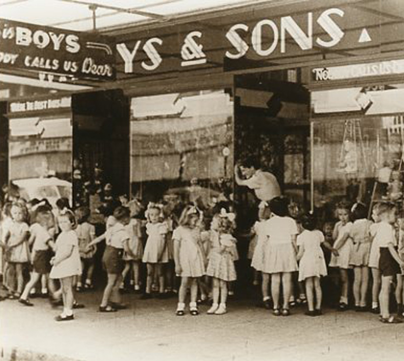 Mrs Wenck and school children looking at the W.Boys & Son department Store window display. Images courtesy of the Maryborough Wide Bay & Burnett Historical Society.