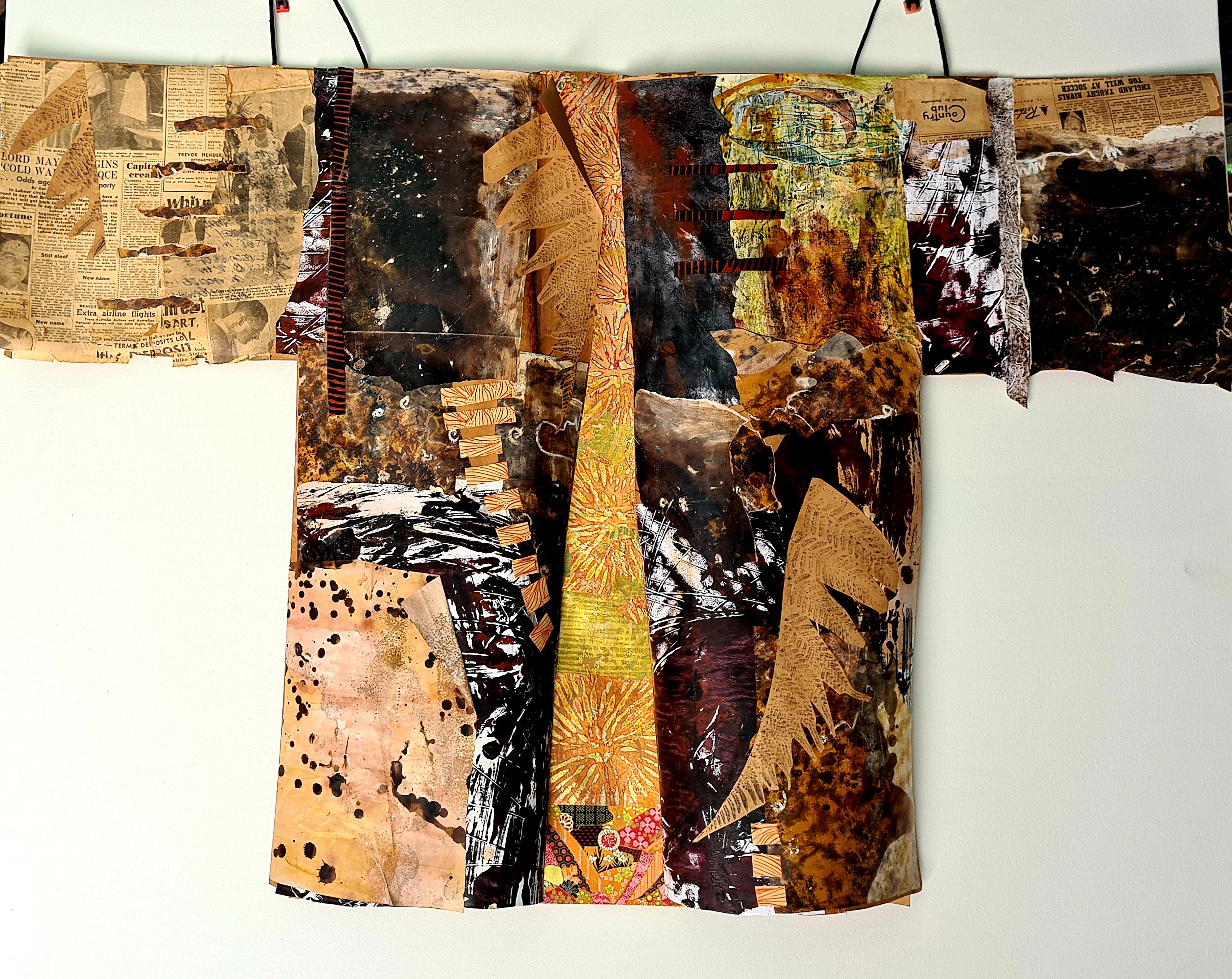 Golden Lining Coat (CoVid lockdown series) Collaged repurposed drawings and monoprints on heavy craft paper. The crucible is for silver, and the furnace is for gold, and the Lord tests hearts. Proverbs 17:3